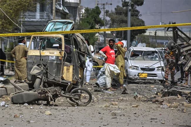 Car bomb kills 10 in Pakistan after militants trigger shootout with troops