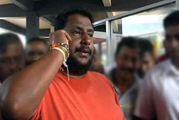 Muthuhettigama leaves for Singapore despite arrest warrant
