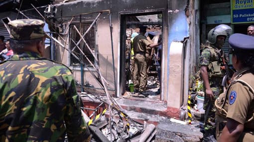 Four more including ex-soldier arrested over Kandy violence