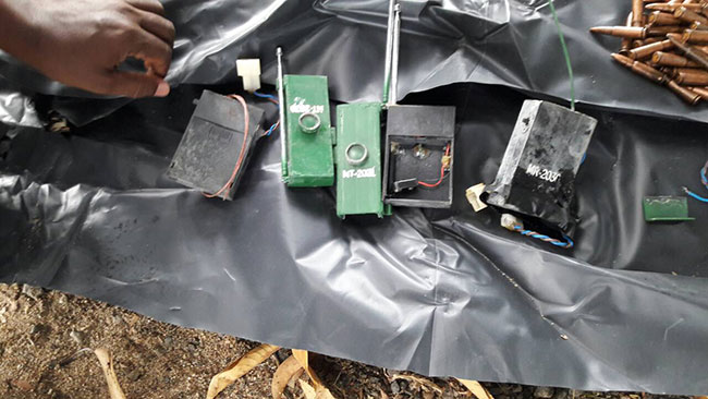 Two nabbed with LTTE uniforms, flags and claymore explosives