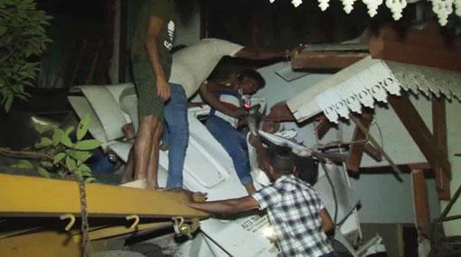 Two dead after container truck veers off road