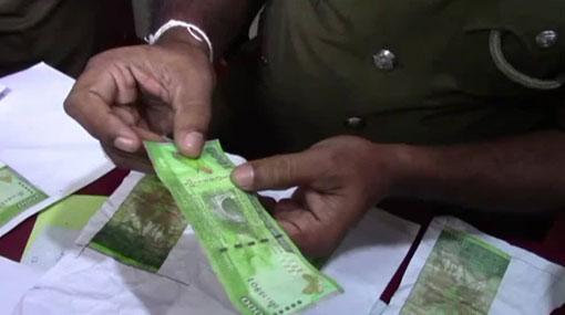 Suspect arrested for printing counterfeit notes at home