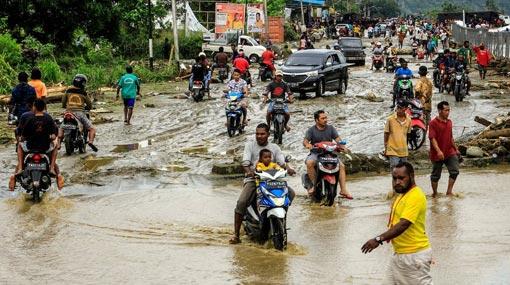 Flash flooding in Indonesia kills at least 50
