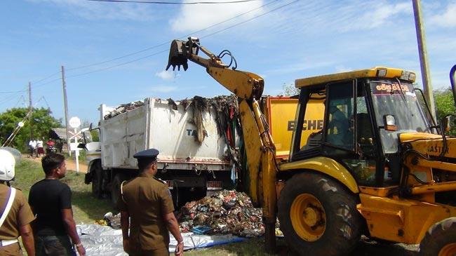 Two tippers carrying Colombo garbage to Aruwakkalu collide with each other