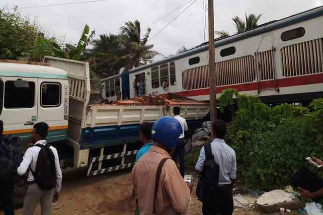 Seven injured as lorry accidentally reverses on to railway track