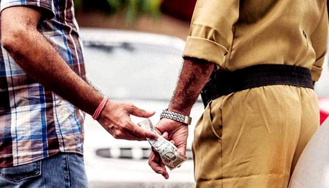 Man arrested attempting to bribe cop