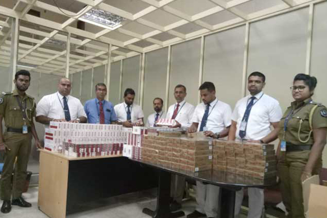 Two Lankans held with foreign cigarettes worth over Rs 3.8 Mn
