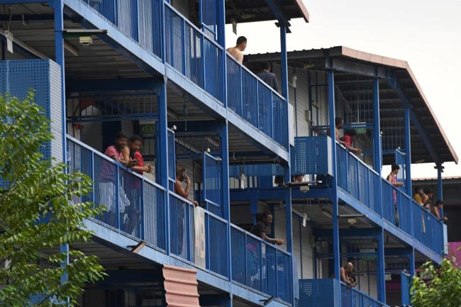 Singapore migrant worker dorms in lockdown as coronavirus cluster grows