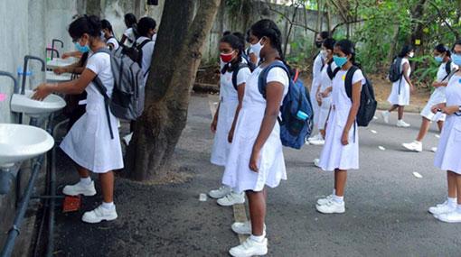 Schools reopen for three grades