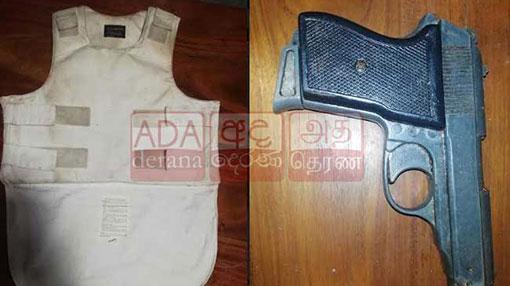 Man arrested with pistol; leads to recovery of ballistic-type bulletproof vest