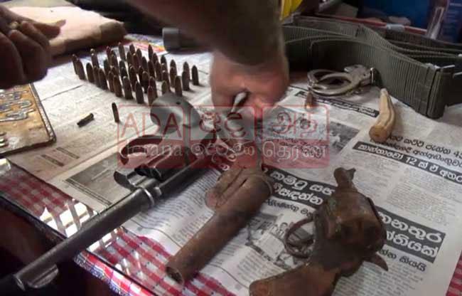 Man arrested with firearms and ammunition