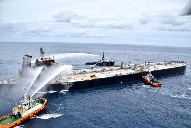 Sparks and extreme temperature reignite doused fire on oil tanker