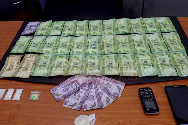 Interdicted postman arrested with drugs and cash