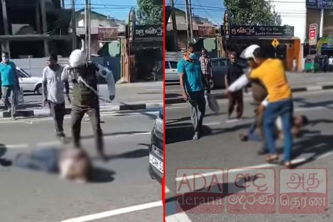 Probe launched into video of cop assaulting man on the road