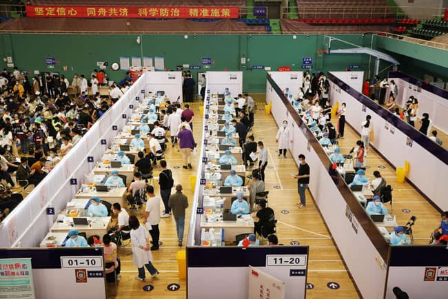 China’s daily COVID-19 vaccine doses hit record 20 million
