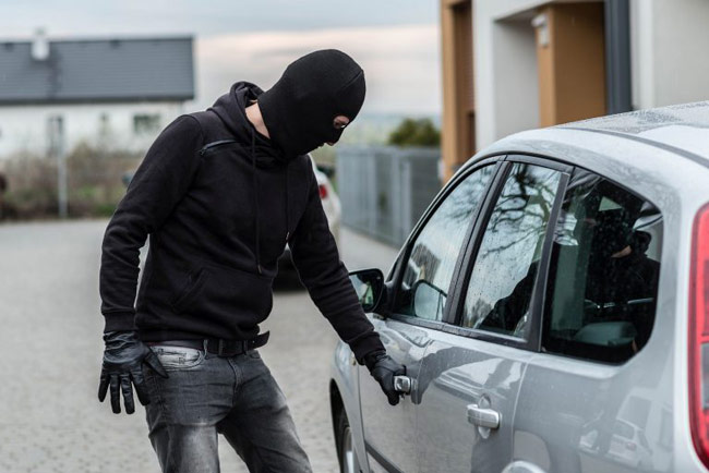Man carjacks parked vehicle with young woman inside