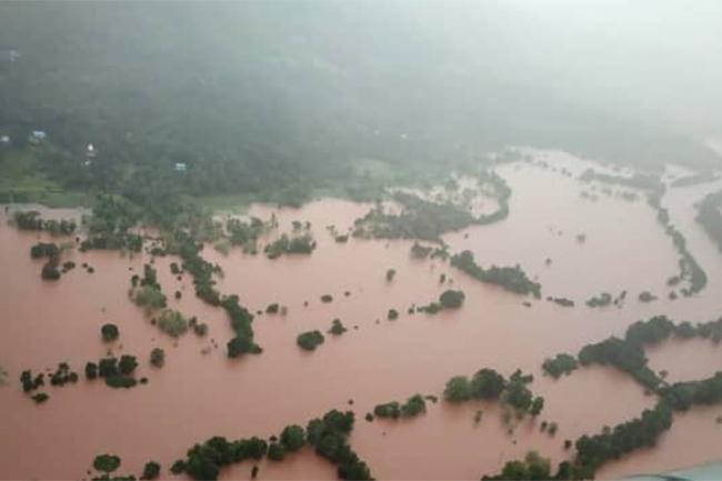 At least 125 dead as heavy rain in India triggers floods, landslides