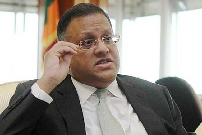 AG wants bond scam case to proceed with two accused in absentia