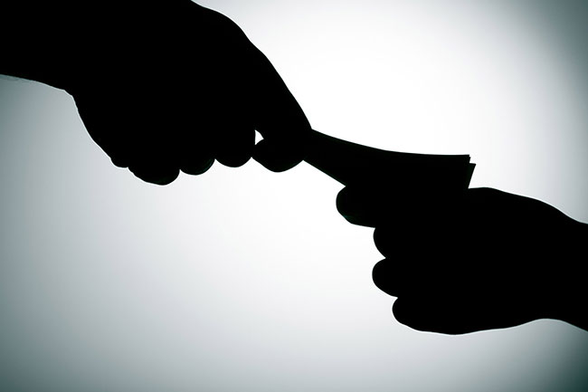 Principal of leading school arrested on bribery charge
