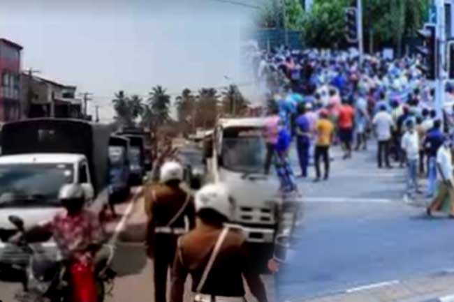 Protesters block Colombo-Negombo road demanding gas