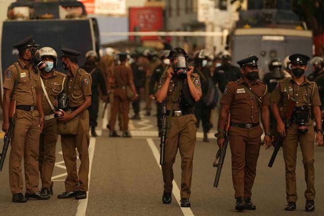 Curfew strictly enforced tonight; police permitted to open fire when necessary to prevent violence