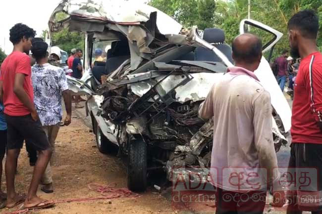 One dead, one injured in van-bus collision