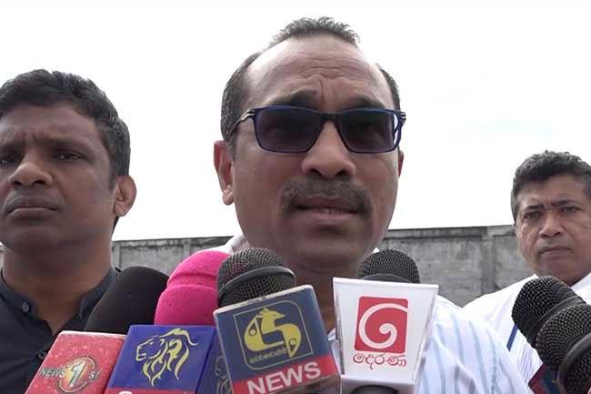 Minister criticizes lack of commitment to address port congestion