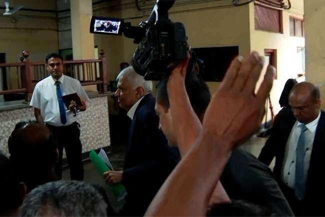 Ex-President Ranil arrives at Bribery Commission