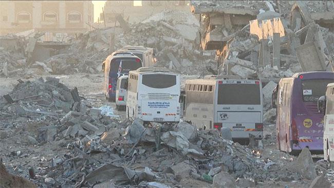 38 buses carrying Palestinian prisoners arrive in Gaza - with all living hostages back in Israel