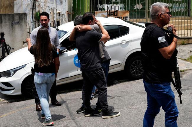 Huge Brazilian raid on Rio gang leaves at least 64 people dead and 81 under arrest