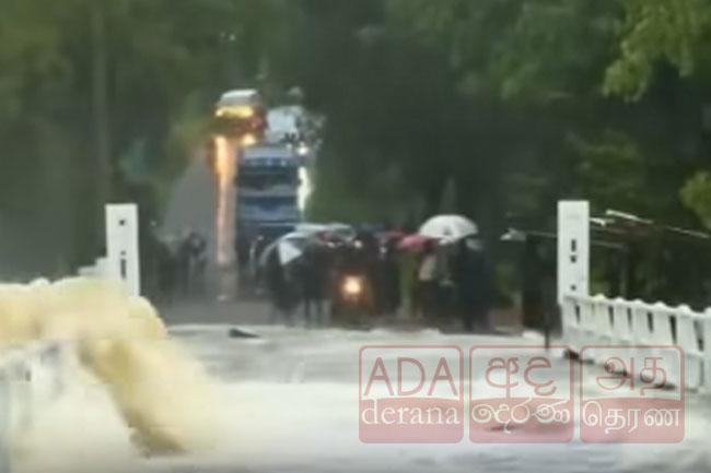 Bus stranded on Kala Oya Bridge: Water rises to waist level of passengers