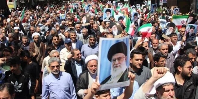 Iran vows to strike back if US attacks as regime change protests continue
