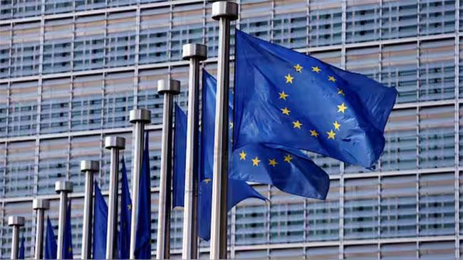 Europe to suspend approval of US trade deal as global markets fall