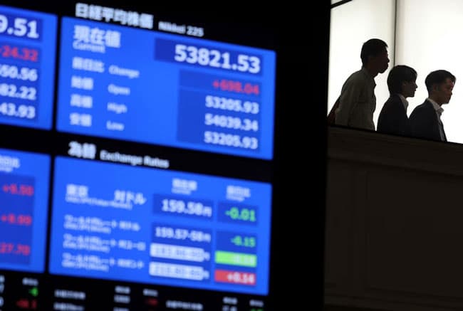 Global stocks struggle, oil jumps as Trump’s Iran deadline looms