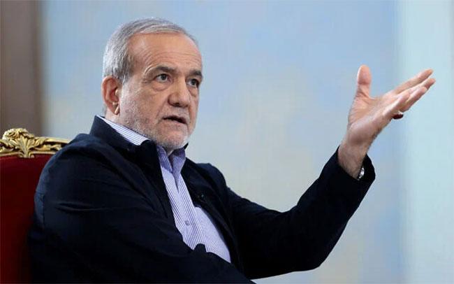 Iran’s President urges Macron, Europe to push US toward deal