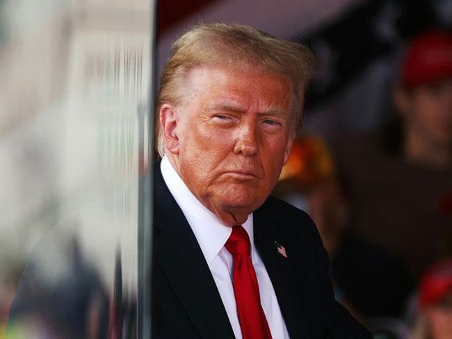 Trump says US and Iran in ‘positive’ talks, unveils plan to escort Hormuz ships