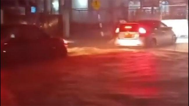 Heavy rainfall floods sections of Wellawaya–Colombo main road, disrupting traffic