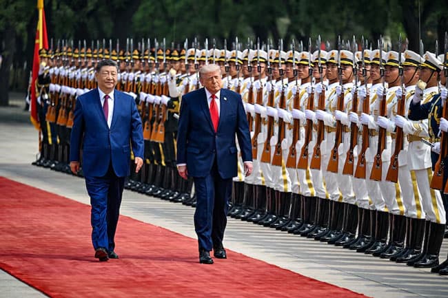 Trump and Xi set for second day of talks after Taiwan warning