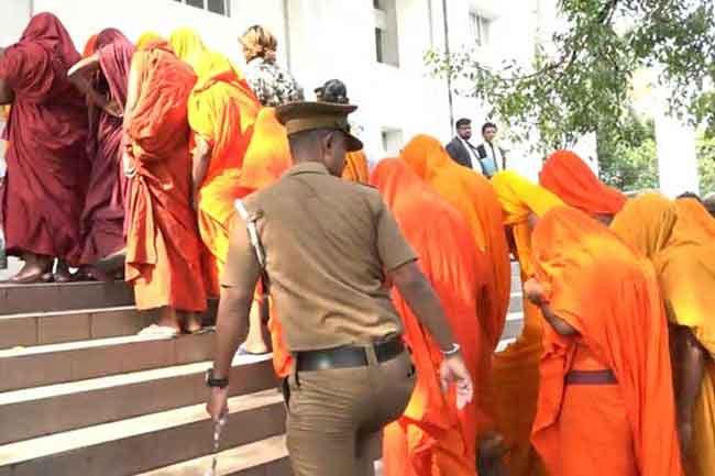 23 monks remanded over drug smuggling urged to voluntarily disrobe