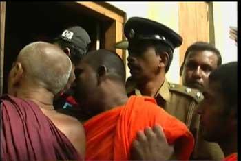 18 persons including 7 Buddhist monks surrender to court over prayer center attack