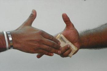 OIC arrested for soliciting Rs.10,000 bribe