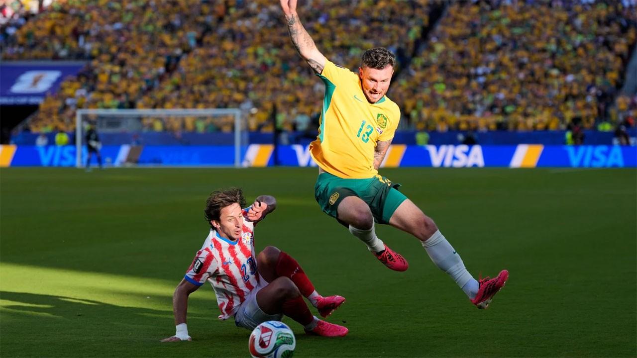 Australia clinches knockout round spot with 0-0 draw; Paraguay also likely to advance