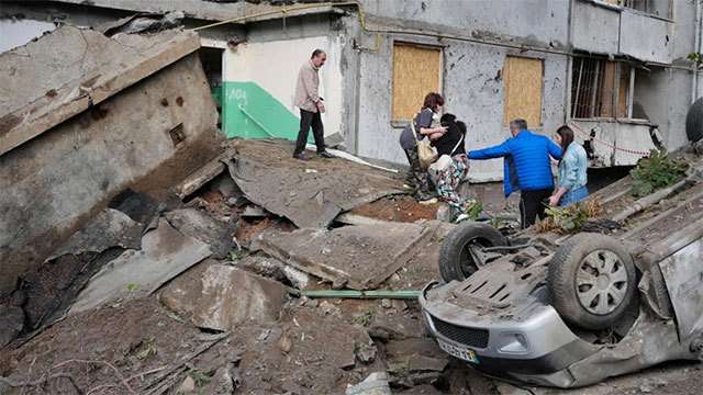 Russian missile and drone attack on Ukraine's capital kills at least 12