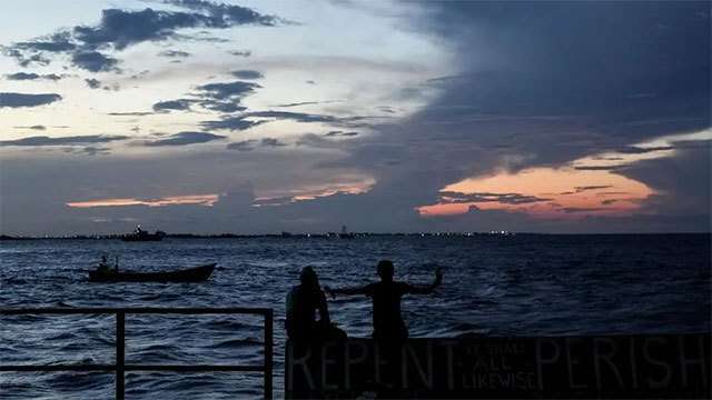 A ferry carrying 133 people capsizes off Guyana's coast, leaving dozens missing