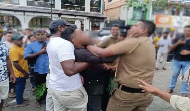 Man arrested for verbally abusing police officers on duty at Kandy Dalada Perahera