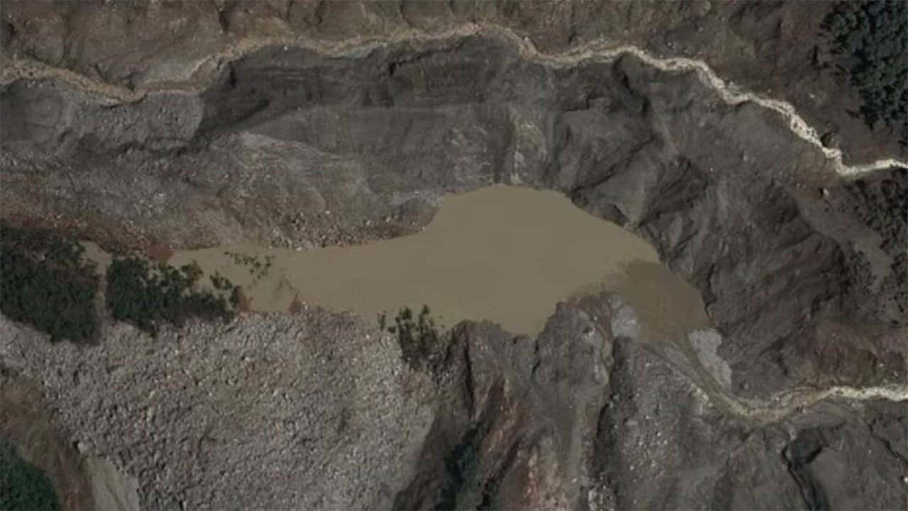 Nepal monitoring two lakes, flood risk to remain until they're fully drained, official says
