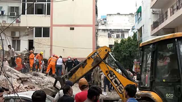 Four dead, several feared trapped after six-storey building collapses in Delhi
