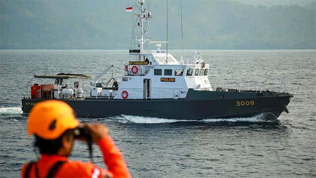 Indonesia rescuers search for 130 people after ferry sinks