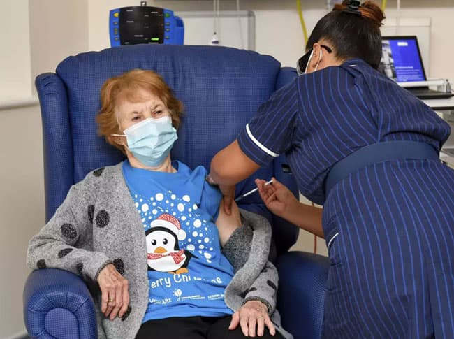First person receives Pfizer Covid-19 vaccine in UK