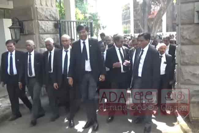 Lawyers stage protest march over killing of lawyer and wife in Akuregoda
